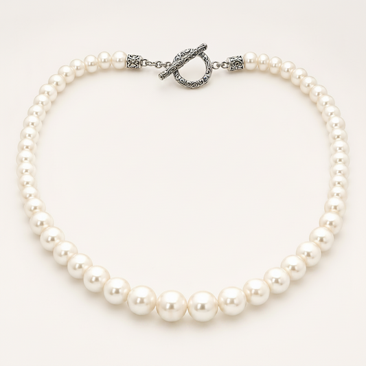 Collana Mutiara perle d'acqua dolce scalare Balinesia, vista dall'alto con chiusura toggle in argento 925 filigrana balinese