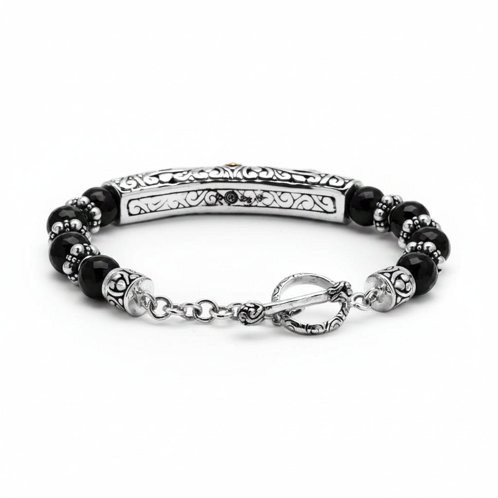 Bracciale Naga, vista posteriore con dettaglio chiusura toggle in argento cesellato e perle di onice nero — Collezione Viaggio a Celuk, Balinesia