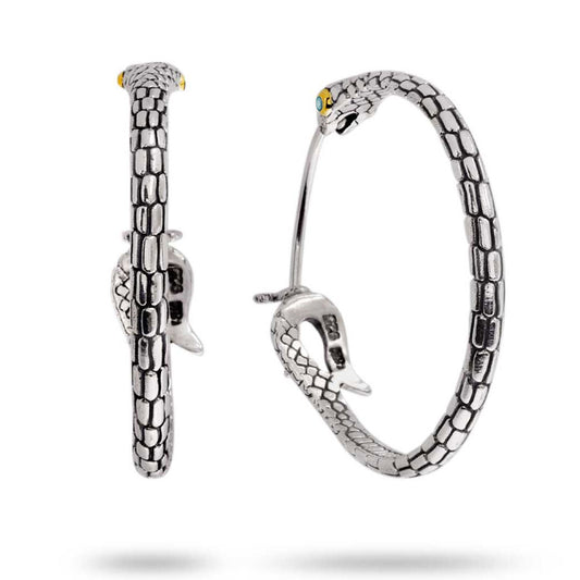 Orecchini Ular Blue Topaz in argento 925 – coppia: profilo laterale e vista 3/4 con occhio in topazio su oro – Collezione Black Mamba Balinesia